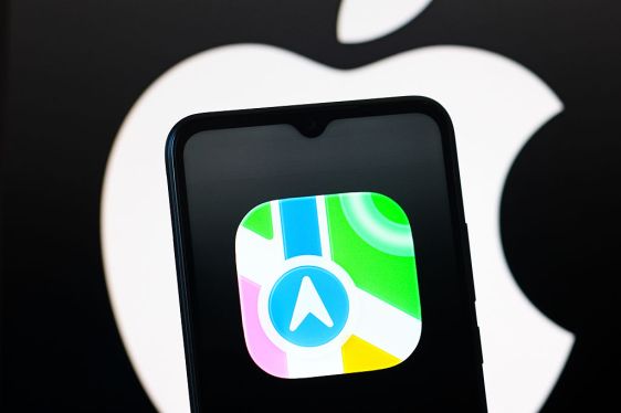 In this photo illustration, the Apple Maps logo is seen displayed on a smartphone screen.