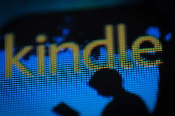 Part of the Kindle application is seen on an iPad.